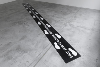 COUNTING 15 BAREFOOT STEPS ON A LOG BRIGDE OVER RED WILLOW CREEK TAOS PUEBLO NEW MEXICO 24 MAY 2003