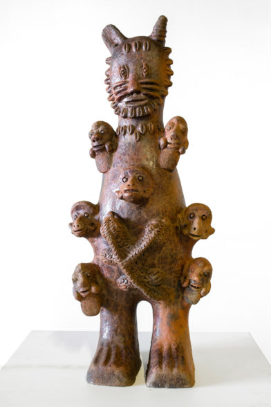 Statue zoomorphe avec tête lion